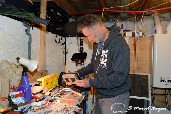 Marcel Huijser makes custom brackets for sensors that detect wildlife and that hook up to his cameras