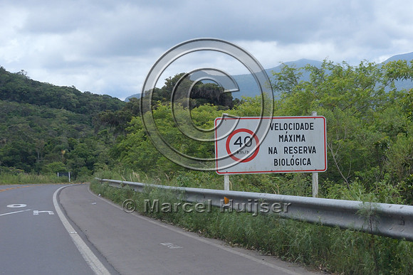 Posted speed limit reduced to 40 km per h in road section (RS-486) through biological reserve (Reserva Biológica Mata Paludosa), Rio Grande do Sul, Brazil