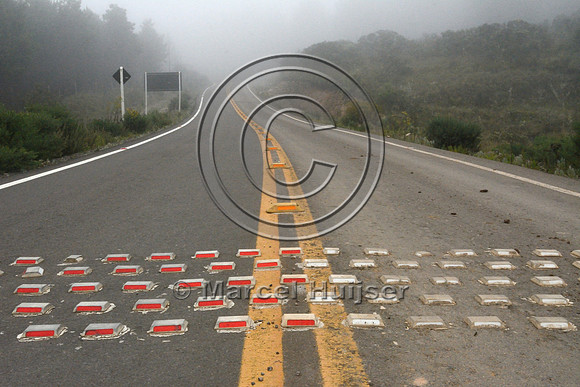 Speed bump intended to reduce vehicle speed on a road through a nature reserve, Parque Nacional de Aparados da Serra, east of Cambará do Sul, Rio Grande do Sul, Brazil