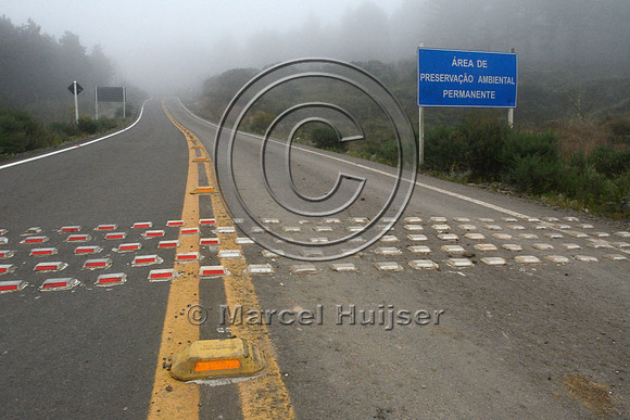 Speed bump intended to reduce vehicle speed on a road through a nature reserve, Parque Nacional de Aparados da Serra, east of Cambará do Sul, Rio Grande do Sul, Brazil