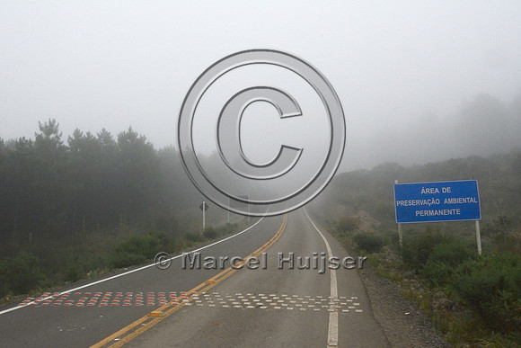 Speed bump intended to reduce vehicle speed on a road through a nature reserve, Parque Nacional de Aparados da Serra, east of Cambará do Sul, Rio Grande do Sul, Brazil