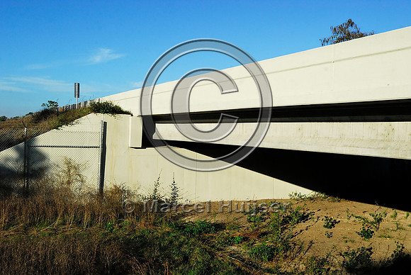 Wildlife underpass for Florida panthers (Puma concolor coryi) and wildlife bridge across canal, SR 29, Florida, USA
