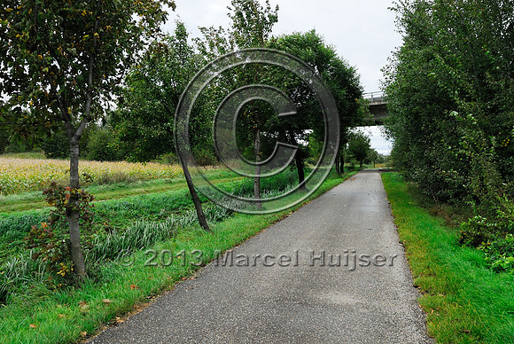 Approach of multifunctional underpass (bridge) with bicycle pedestrian path, under A4 motorway, Parndorf, Austria