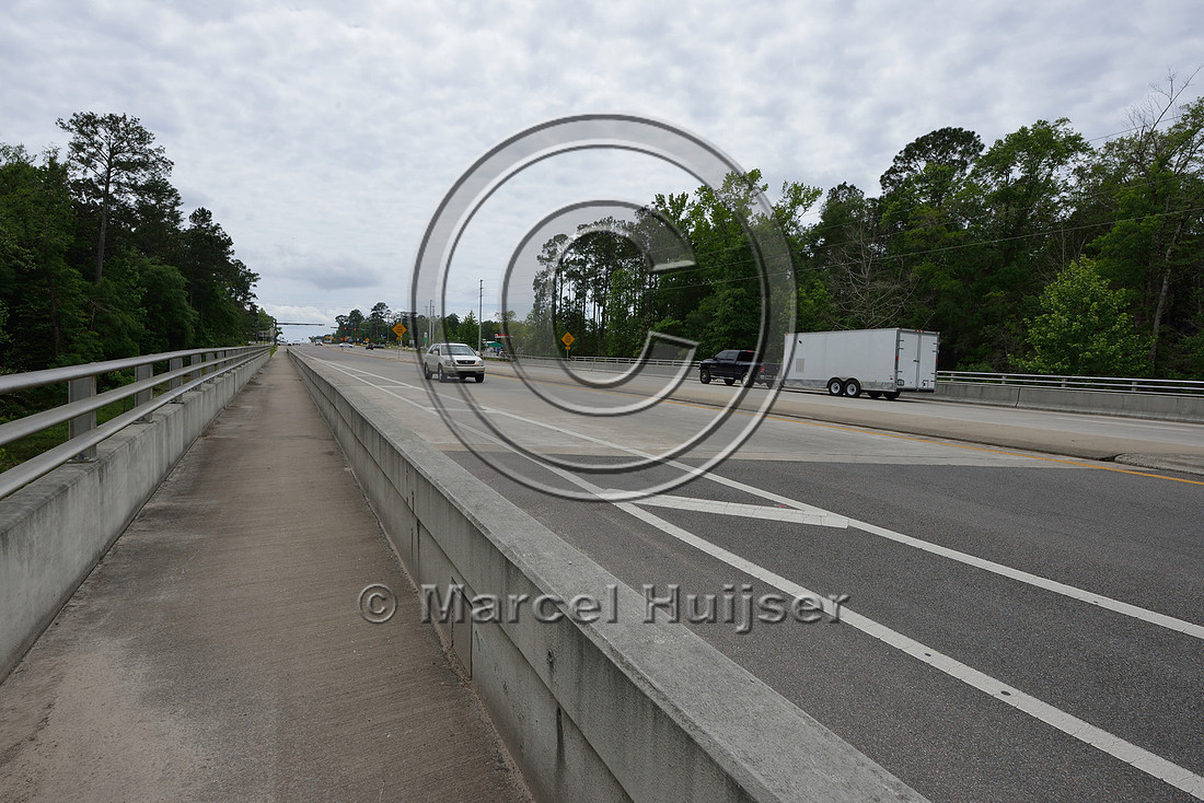 Bike and pedestrian path over multifunctional underpass (about 56 m wide for water and wildlife), Hwy 331, Hwy 83 near Freeport, Florida, USA
