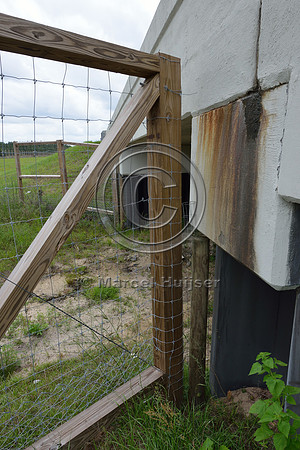 Tight connection (no gap) between last fence post and wall of the wildlife underpass, Hwy 331, Hwy 83 near Freeport, Florida, USA