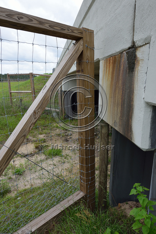 Tight connection (no gap) between last fence post and wall of the wildlife underpass, Hwy 331, Hwy 83 near Freeport, Florida, USA