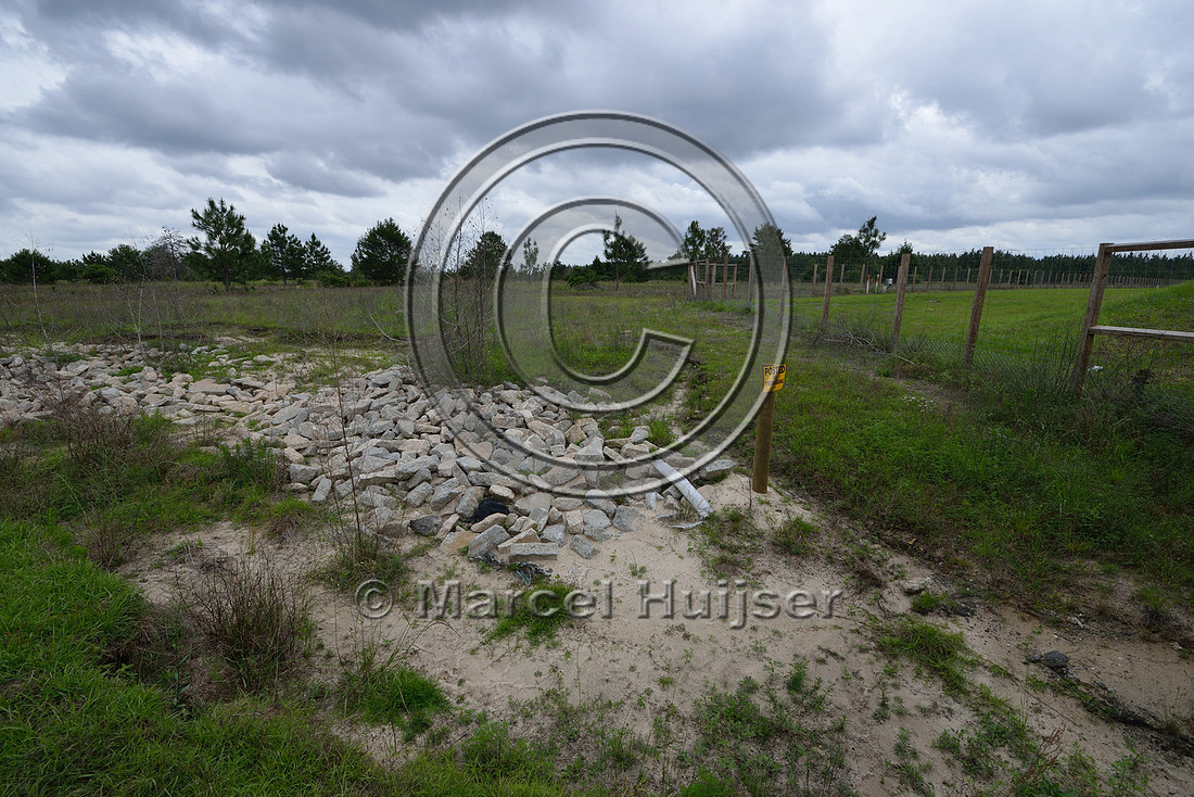 Sign, posted, no trespassing, at entrance and exit of wildlife underpass, Hwy 331, Hwy 83 near Freeport, Florida, USA