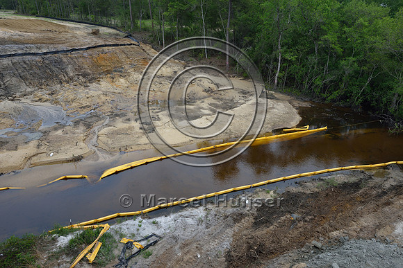 Erosion control at stream at construction of new bridge in association with highway widening (4 lanes to 2 lanes), Hwy 331, Hwy 83 near Freeport, Florida, USA