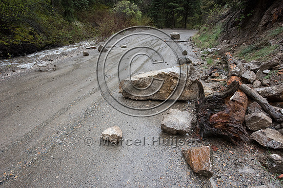 Rockfall on a dirt road after heavy precipitation, Montana, USA