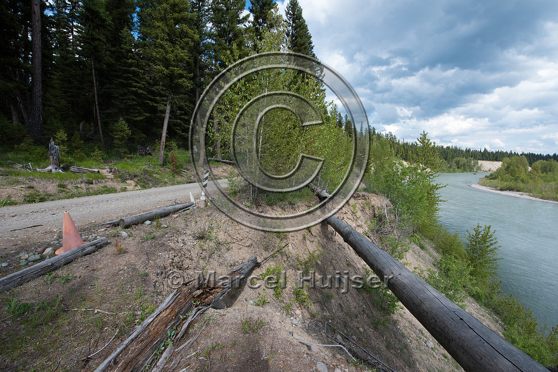 The North Fork of the Flathead river erodes river bank and adjac