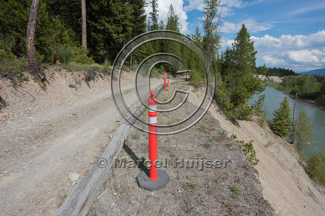 The North Fork of the Flathead river erodes river bank and adjac