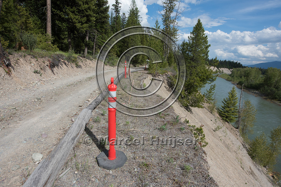 The North Fork of the Flathead river erodes river bank and adjac