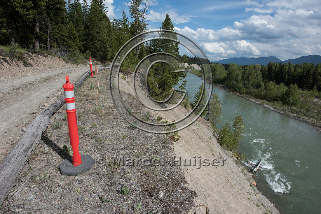 The North Fork of the Flathead river erodes river bank and adjac