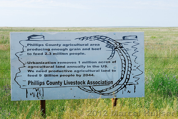Road sign near American Prairie Reserve, agricultural production, near Sun Prairie, Montana, USA