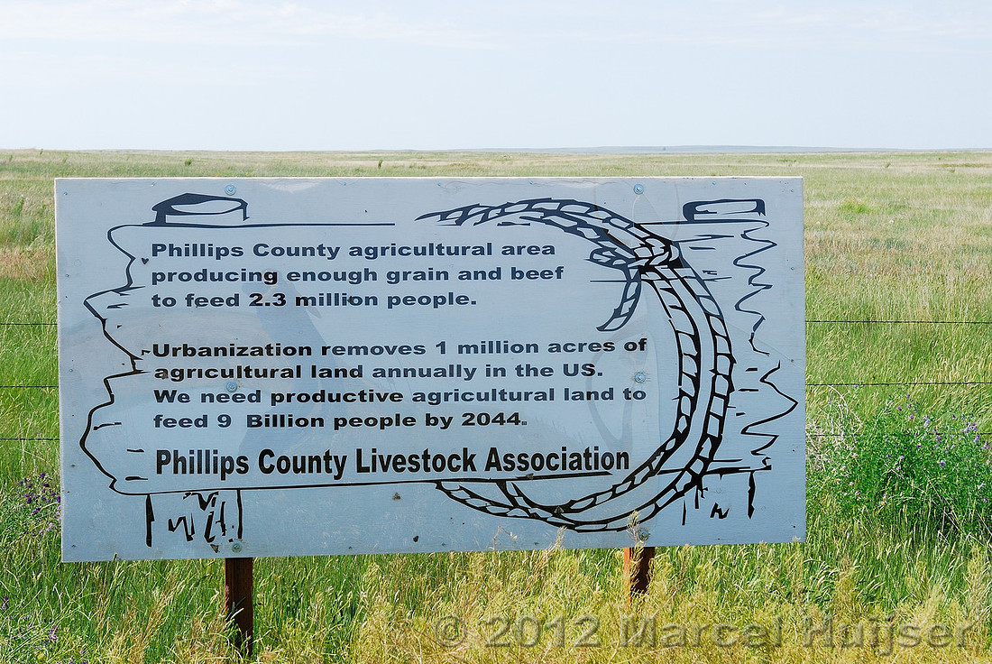 Road sign near American Prairie Reserve, agricultural production, near Sun Prairie, Montana, USA