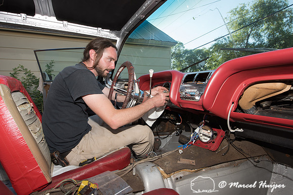 Daniel McCue in the process of restoring his 1959 Ford Thunderbi