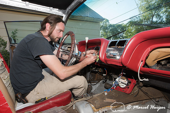 Daniel McCue in the process of restoring his 1959 Ford Thunderbi