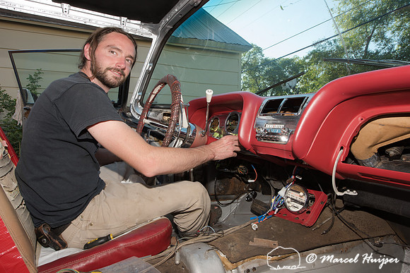 Daniel McCue in the process of restoring his 1959 Ford Thunderbi