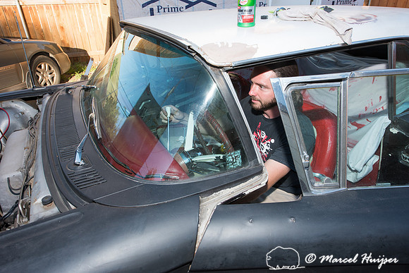 Daniel McCue in the process of restoring his 1959 Ford Thunderbi