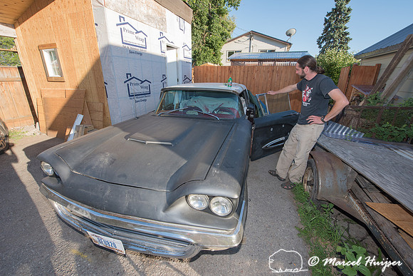 Daniel McCue in the process of restoring his 1959 Ford Thunderbi