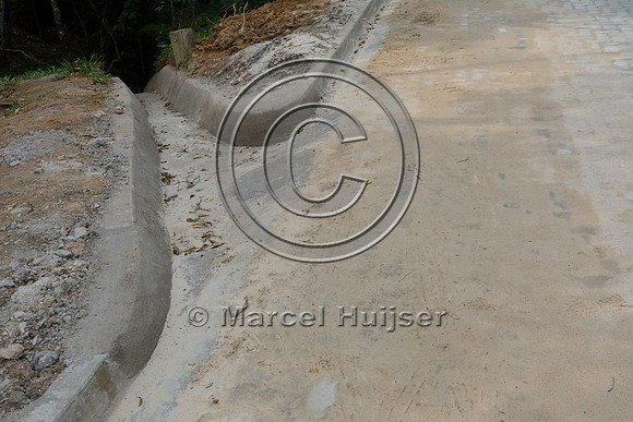 Road runoff is drained into stream, Parque Estadual 'Carlos Botelho', São Paulo, Brazil