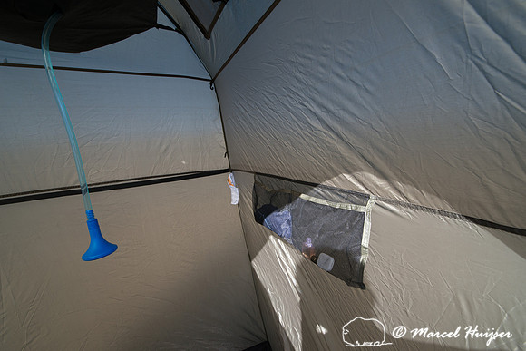 Warm shower in the field, Montana, USA