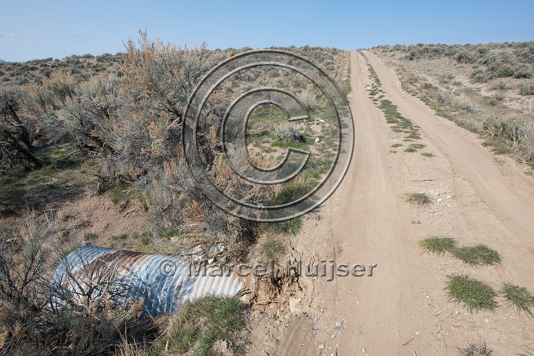 Runoff from dirt road causes erosion at culvert, Montana, USA