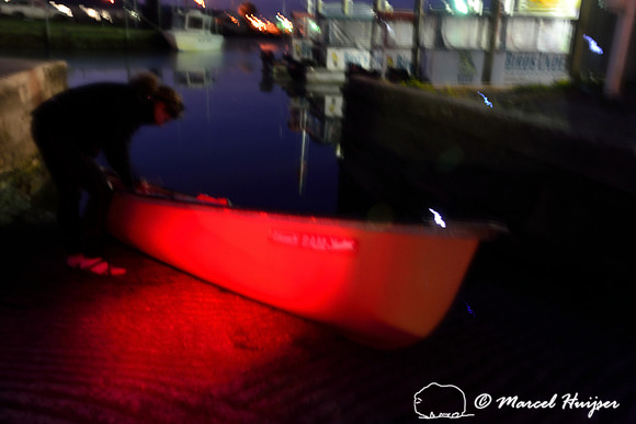 Making the canoe ready before first light to paddle to the manatees, Crystal River, Kings Bay, Florida, USA.