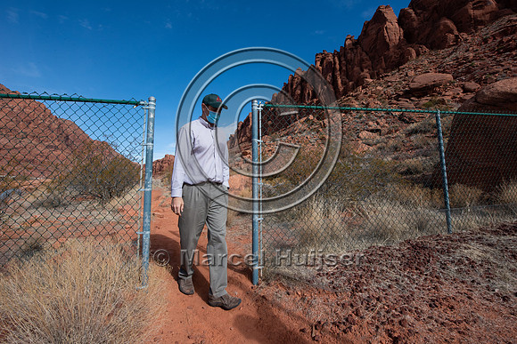 Fence for people and Mojave desert tortoise (Gopherus agassizii)