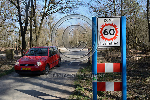 Mandatory maximum speed limit 60 km per hour zone, at wildlife guard (cattle guard), near Kootwijk, The Netherlands
