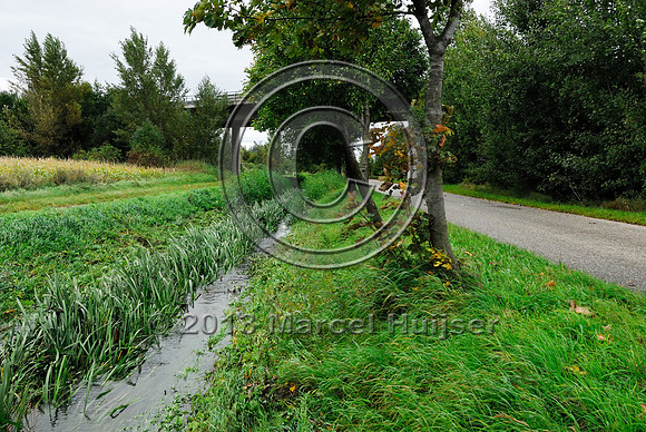 Farm road, ditch and bike pedestrian pathway, multifunctional underpass, across A4 motorway, Parndorf, Austria.