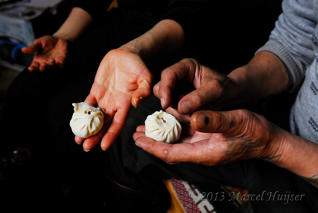 Travel: Making buuz (Mongolian steamed dumplings) with Nara in his ger, along Onon river, near Norovlin, Khentii, Mongolia.