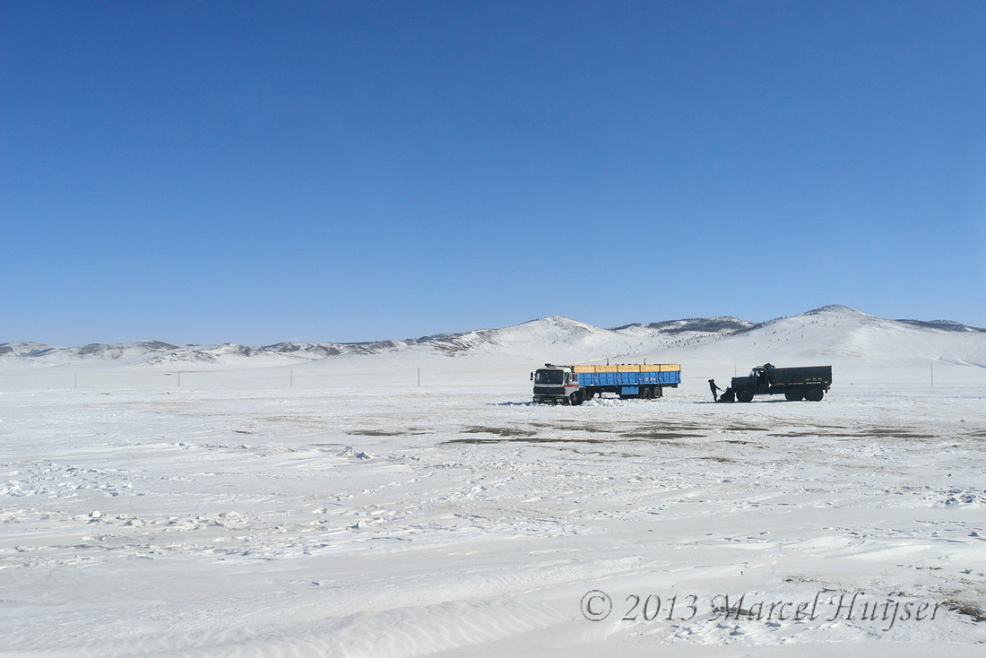 Semi-truck stuck in snow bank, near Bayan-Adarga, Khentii, Mongolia