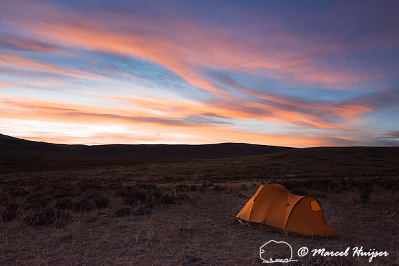Sunset and tent in the high plains, Montana, USA