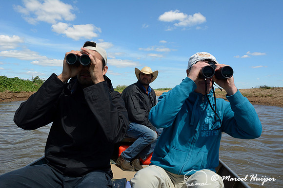 Bird watching in Tanquã wetland with Alex Augusto de Abreu Bovo (left), Evanildo (the boatman, center) and Frans Lindenkamp (right), Rio Piracicaba, São Paulo, Brazil