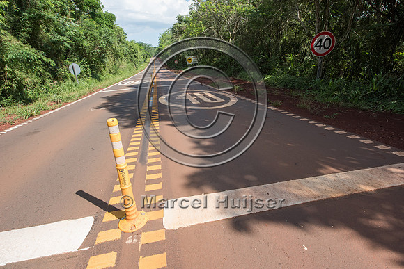 _DSC6943 Rumble strips and cones in a speed reduction zone for wildlife, Puerto Iguazú, Parque Nacional Iguazú,-Misiones,-Argentina