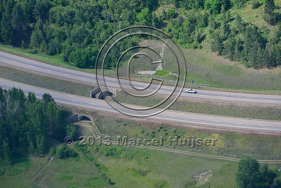 Wildlife underpass with opening in median (Polson Hill) US Hwy 93, Flathead Indian Reservation, Montana, USA