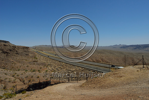 Looking back down south on highway from wildlife overpass designed for desert bighorn sheep (Ovis canadensis nelsoni), US Hwy 93, NW Arizona, USA