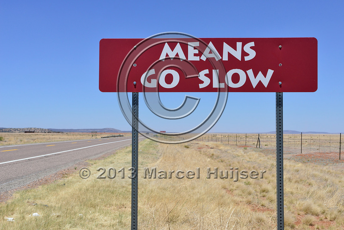 Means go slow. Burma-Shave cattle crossing sign series, US Hwy 66, Arizona, USA