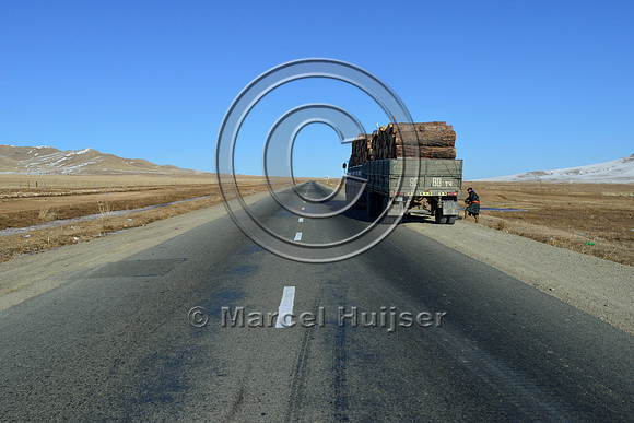 Broken down truck along highway between Ulaaanbaatar and Hustai Nuruu National Park, Töv, Mongolia.