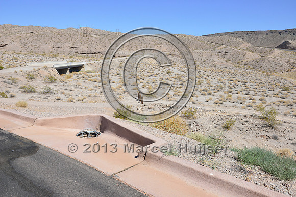 Roadside gutter and drangage pipe to reduce erosion, Arizona, USA