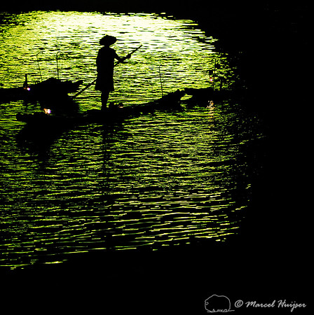 Chinese fishermen in a light show, Li River, Yangshuo, China