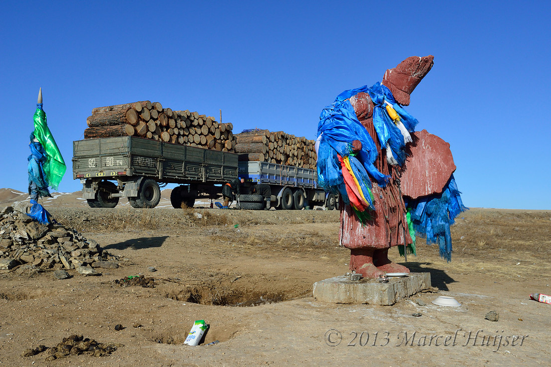 Travel: Silk scarves tied to a shaman statue, along highway between Ulaaanbaatar and Hustai Nuruu National Park, Töv, Mongolia