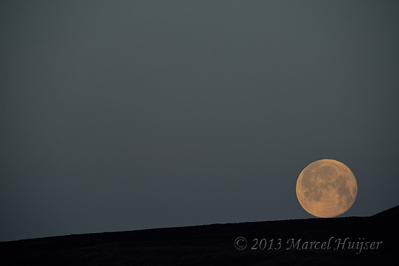 Oops... full moon rolling down the hill, near Bannack, Montana, USA