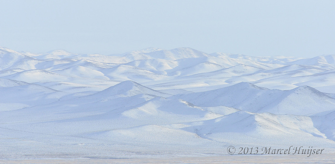Asian landscapes: Snow covered mountains, Hustai Nuruu National Park, Töv, Mongolia