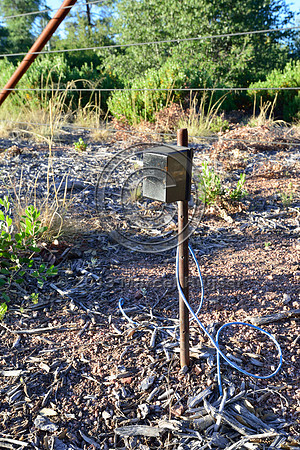 Break-the-beam counter associated with an animal detection and driver warning system at a fence end, S.R. 260 east of Payson, Arizona, USA
