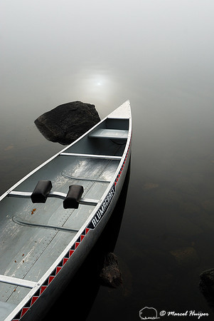 Canoe in mist, Boundary Waters, Minnesota, USA
