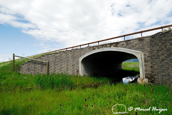 Multi-functional underpass for wildlife and water, US Hwy 93, near St Ignatius, Flathead Indian Reservation, Montana, USA