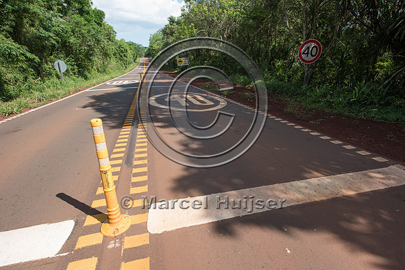 _DSC6944 Rumble strips and cones in a speed reduction zone for wildlife, Puerto Iguazú, Parque Nacional Iguazú,-Misiones,-Argentina