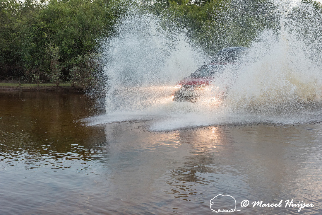 Crossing a stream, Mitsubishi 4x4, L200 Triton Savana, on wildli